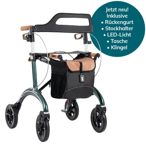 Ein moderner, vierrädriger Rollator in Dunkelgrün steht auf weißem Untergrund. Er besitzt braune Griffe, eine schwarze Sitzfläche mit schwarzem Rückengurt und eine vordere Einkaufstasche mit braunem Deckel. Oben rechts befindet sich eine dunkle, runde Grafik mit der Aufschrift „Jetzt neu! Inklusive Rückengurt, Stockhalter, LED-Licht, Tasche, Klingel“. Die Tasche hat ein angebrachtes LED-Licht und der Rollator ist mit Bremskabeln und sichtbaren Bremshebeln ausgestattet. Die Räder sind groß und schwarz.